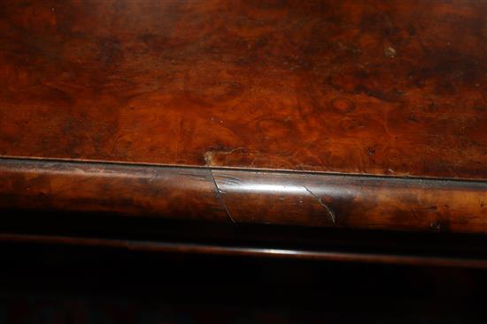 A Victorian burr walnut two drawer library table W.114cm